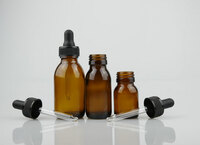 more images of AMBER GLASS SYRUP BOTTLES