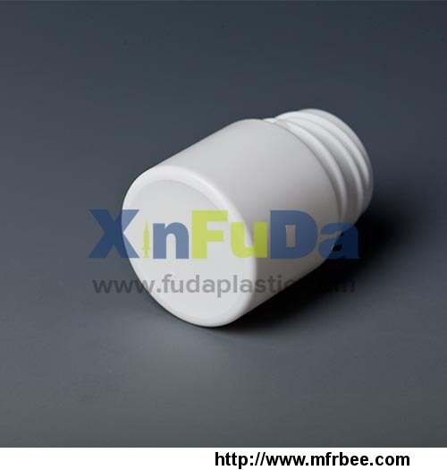 double_cap_of_small_plastic_medicine_bottle