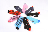 Women's 144N full cushion sport low cut socks with pom pom and with non-skids
