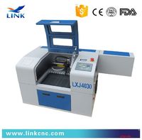 more images of acrylic/ wood/ rubber/ glass/plastic /stone/granite laser engraving machine