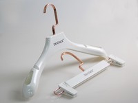 more images of white baking finished plastic clothes hanger