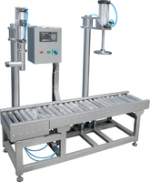 Paint drum filling and capping machine