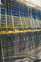 Hydraulic climbing formwork system for massive concrete building construction