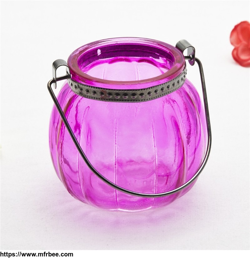 supply_of_colored_pumpkin_machine_made_glass_candle_holder_with_wire_handler