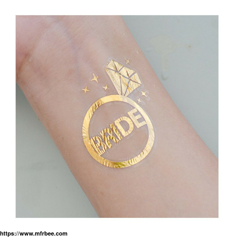 shimmering_gold_bride_with_diamond_ring_tattoo_for_an_unforgettable_hens_night