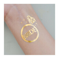 Shimmering Gold Bride With Diamond Ring Tattoo For An Unforgettable Hens Night
