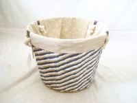 eco-friendly handmade woven laundry storage basket with white handles