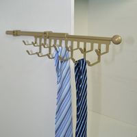 Wardrobe side mount pull out tie rack