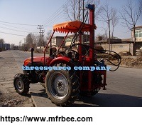 tractor_drilling_rig_in_farmland_area