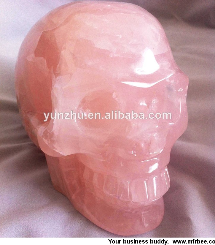 natural_crystal_stone_carved_pink_gemstone_skull_sculpture
